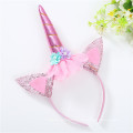 Amazon Top Sell Wholesale Mignon Design Unicorn Horn Bandband avec une fleur artificielle